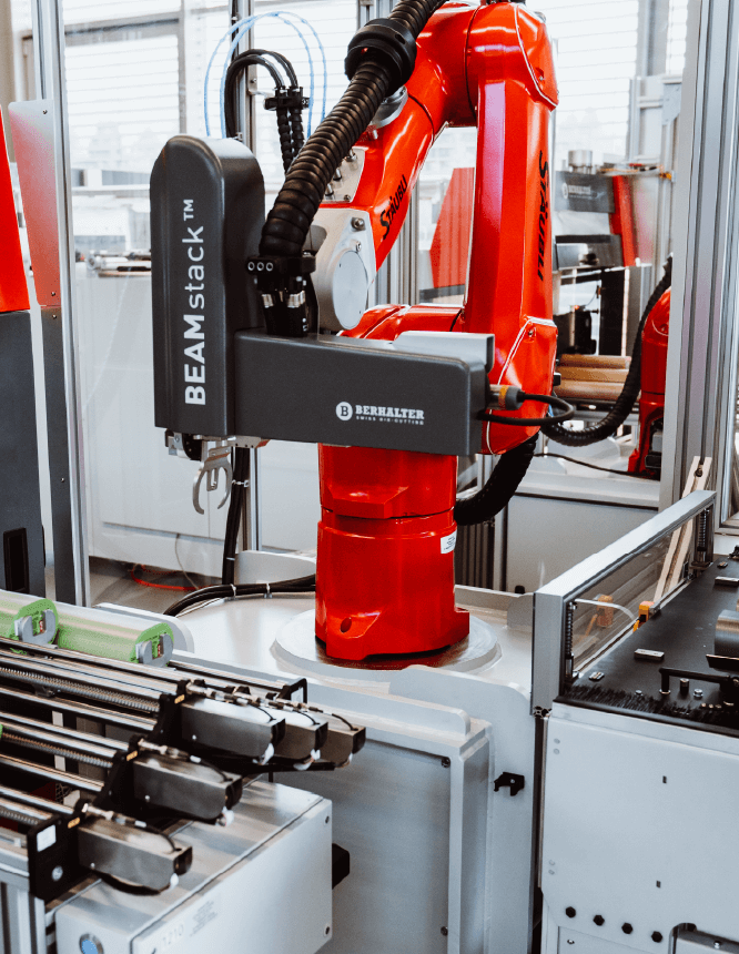 BEAMstack™ – Automated robotic stacking system by BERHALTER Swiss Die-Cutting for high-precision packaging automation.
