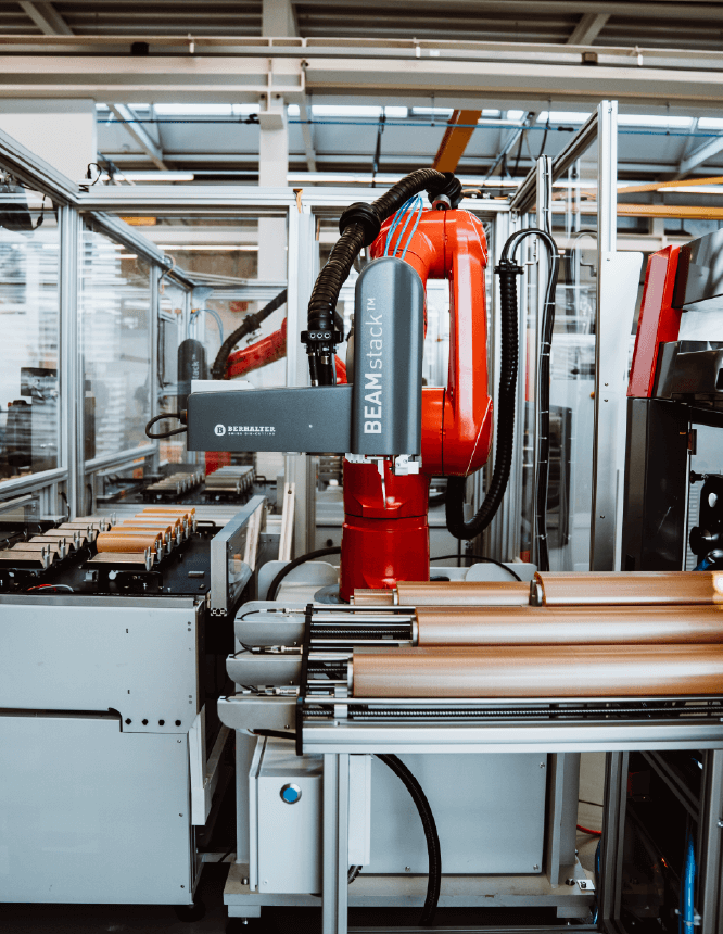 BEAMstack™ – Automated robotic stacking system by BERHALTER Swiss Die-Cutting for precision packaging and increased efficiency.