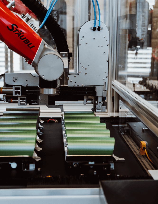BEAMstack™ robotic system in action, precisely placing die-cut products on a conveyor.